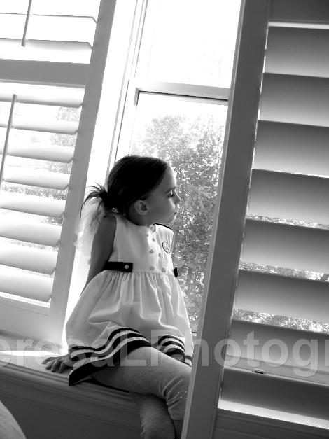 Hope Looking Out Window