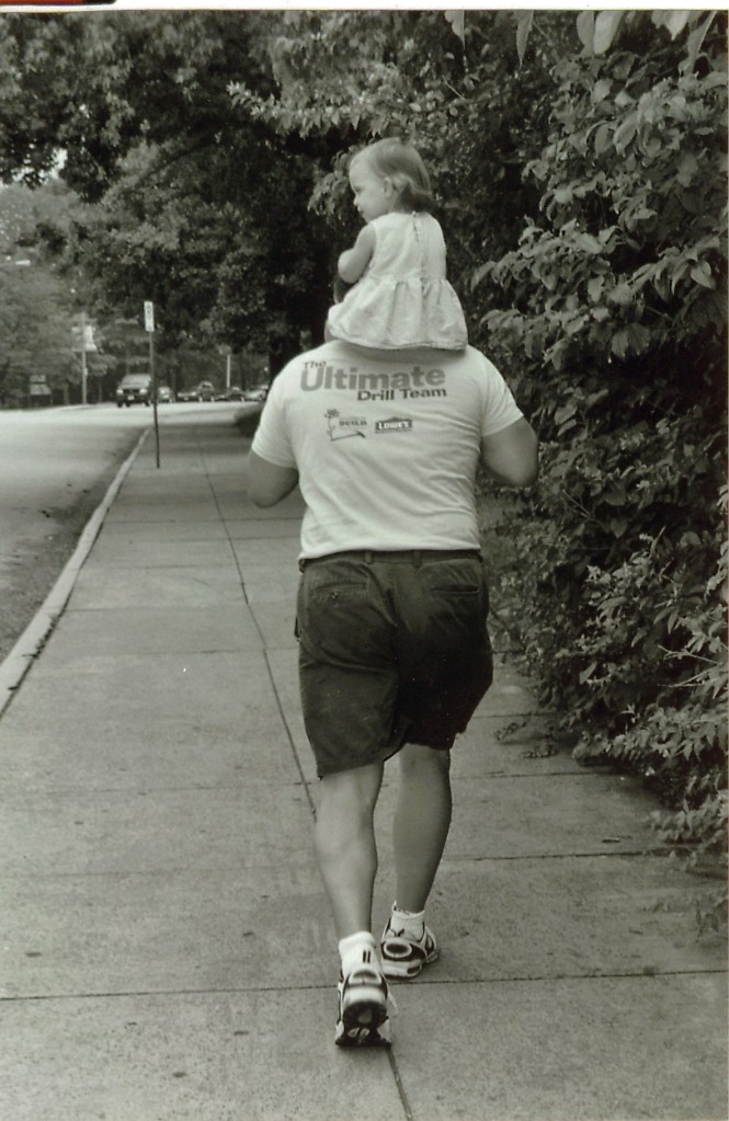 This image has an empty alt attribute; its file name is baby-on-dads-head_2.jpg